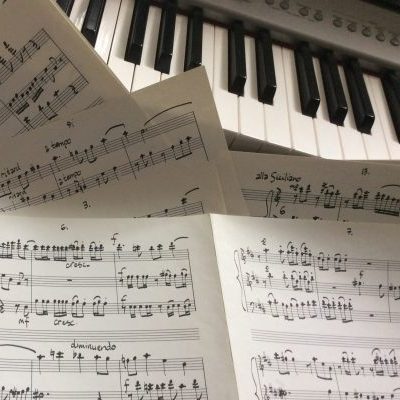 Tim Janz Composition 1 sheet music with piano in background